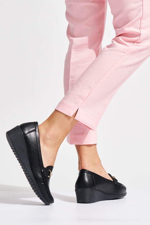 black Inomens INomens moccasins on a...