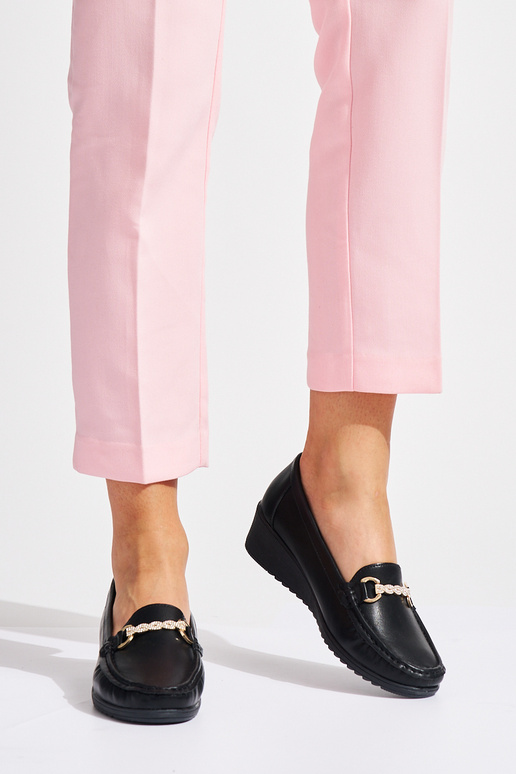 black Inomens INomens moccasins on a...