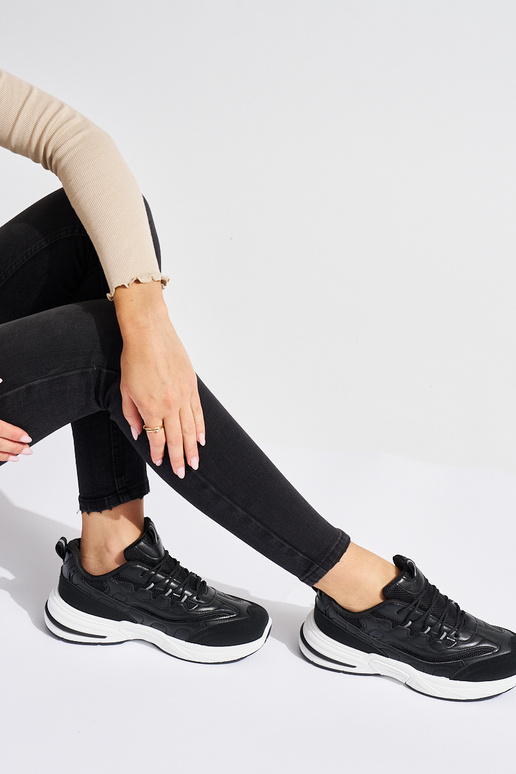 black Inomens sneakers on a thick sole black Inomens sneakers on a thick sole