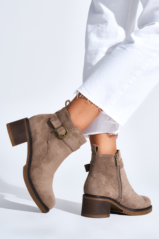 beige boots of suede on the heel beige boots of suede on the heel