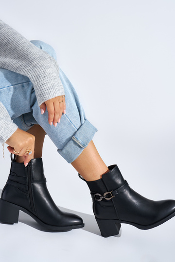 black Inomens boots on the... 2