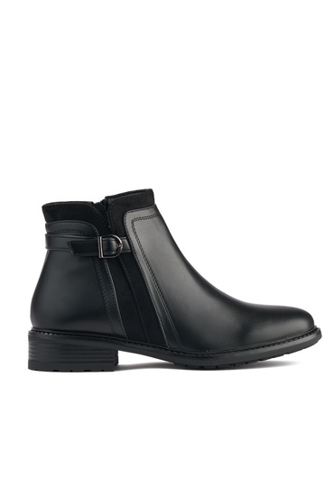 black Inomens boots on a...