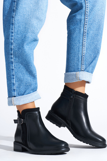 black Inomens boots on a... 2