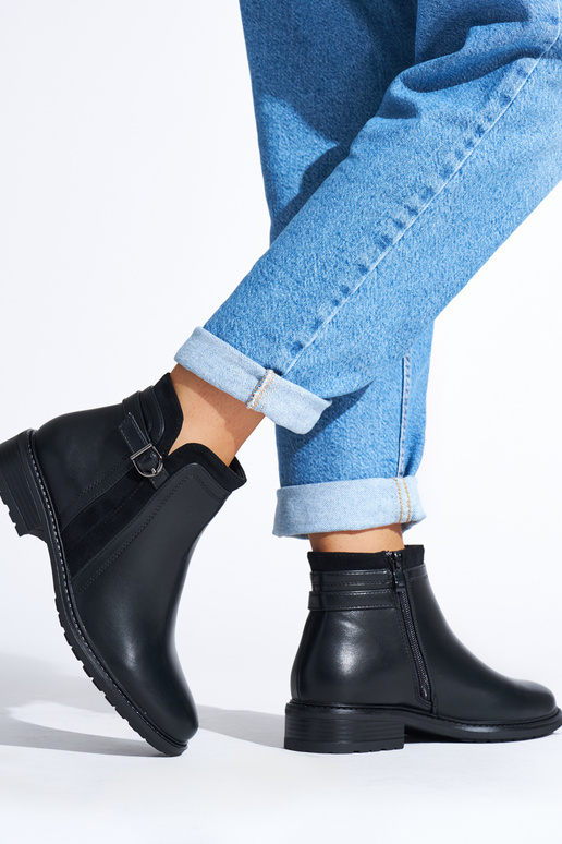 black Inomens boots on a loIn heel