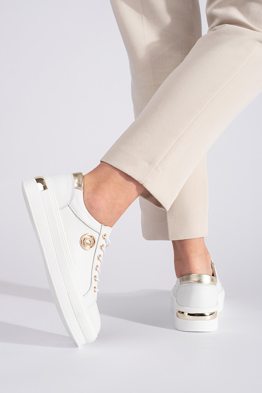 INhite color leather Sneakers on a...