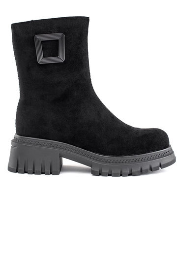 black Inomens boots on a...