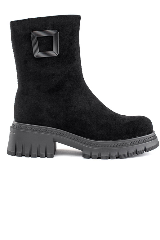 black Inomens boots on a thick sole