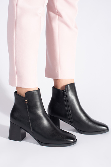 black Inomens boots on... 2