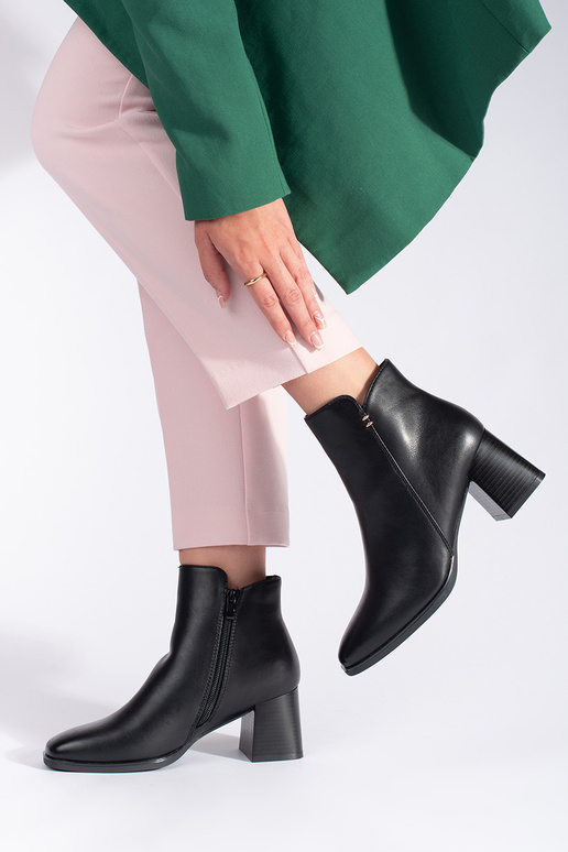 black Inomens boots on highheels