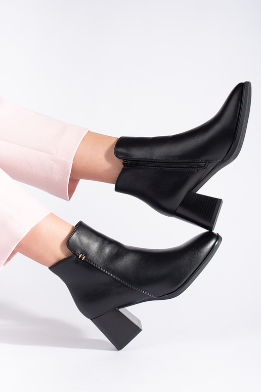 black Inomens boots on highheels