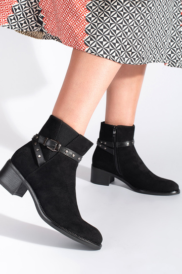 of suede black boots on a... 2