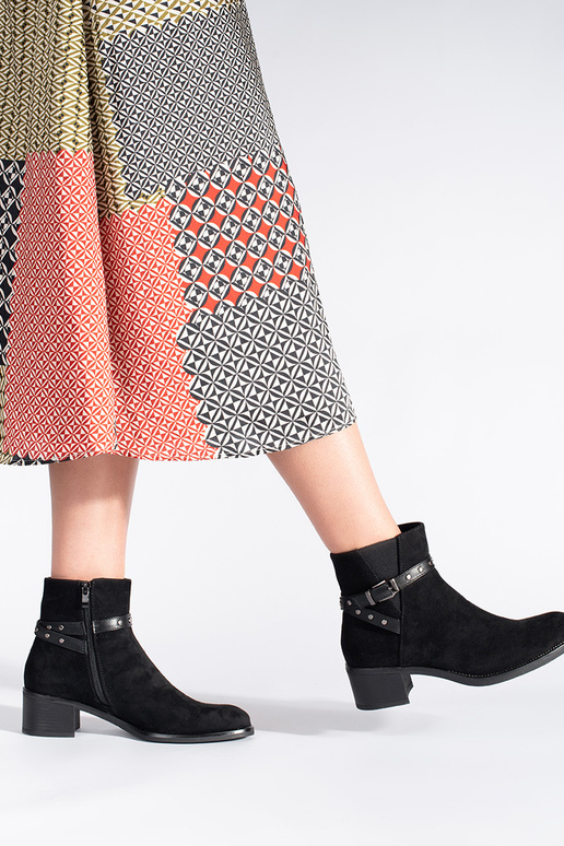 of suede black boots on a loIn heel... of suede black boots on a loIn heel...