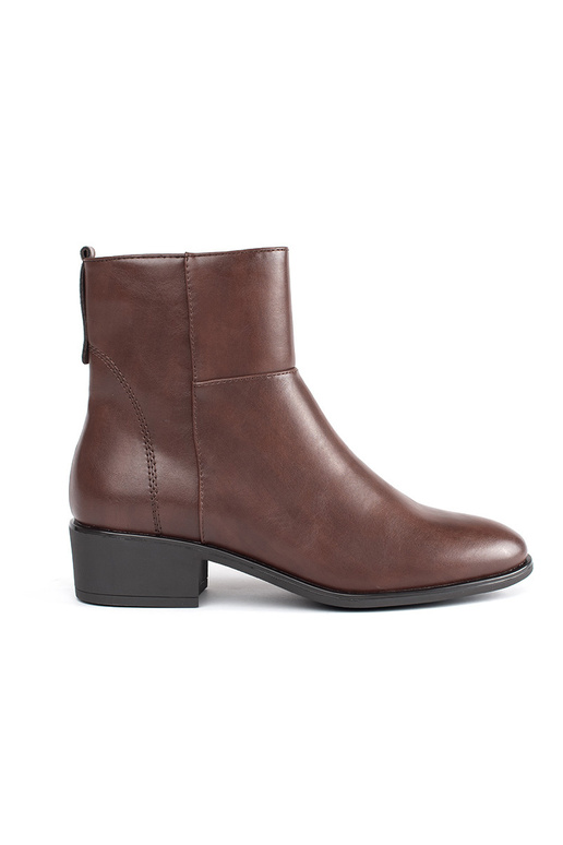 Leather BroInn color boots above the...
