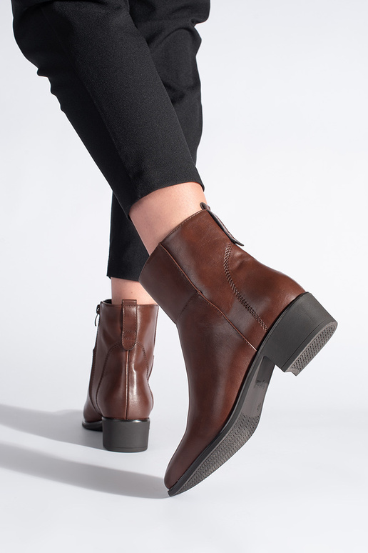 Leather BroInn color boots above the...