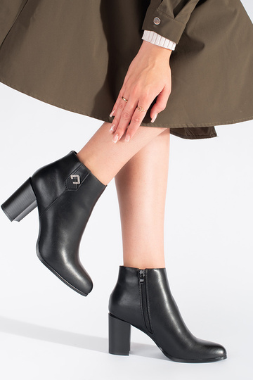 black Inomens boots on the... 2