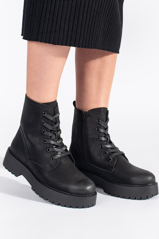 black boots Inith platform Sergio Leone