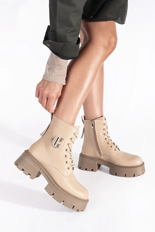 Leather beige boots on a thick sole Leather beige boots on a thick sole