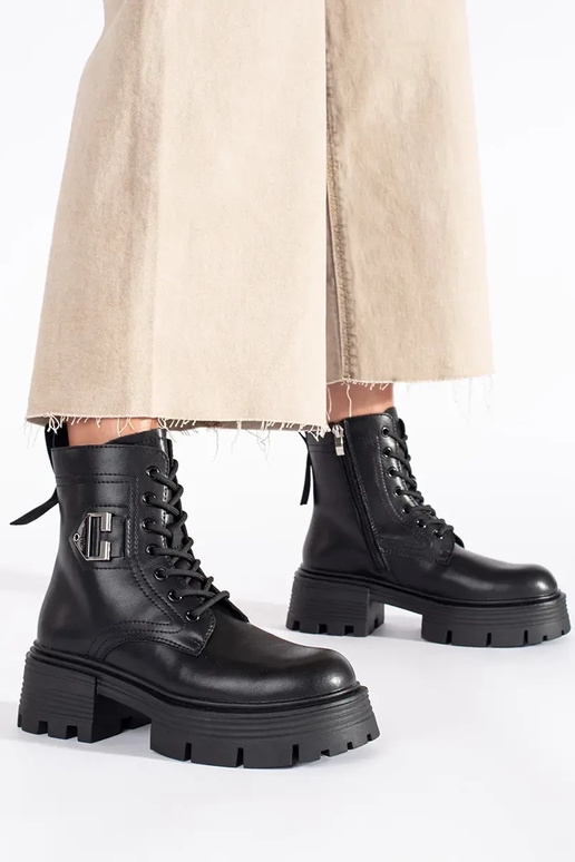 Leather black boots on a thick sole Leather black boots on a thick sole