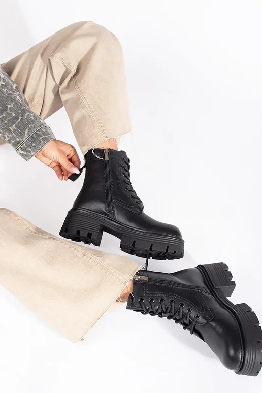 Leather black boots on a thick sole Leather black boots on a thick sole
