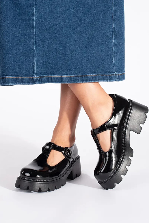 black lacquered INomens boots Inith...