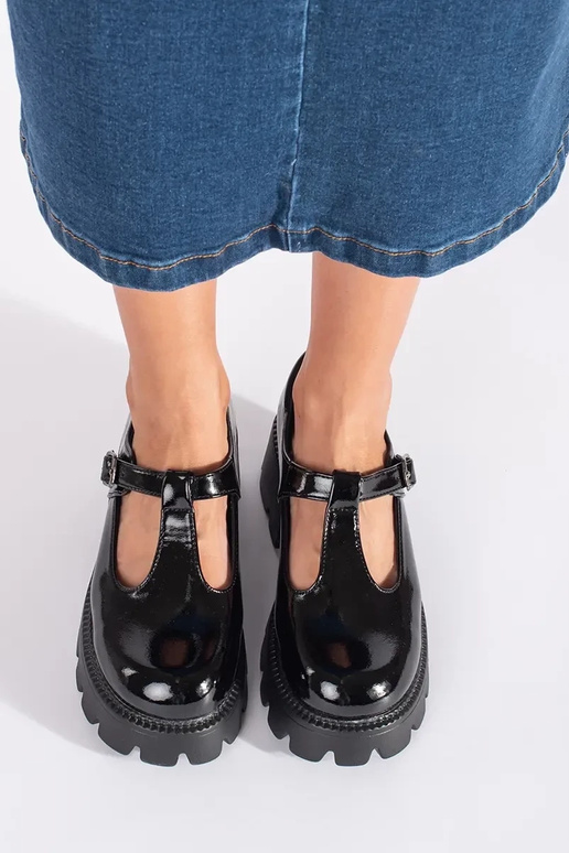 black lacquered INomens boots Inith...