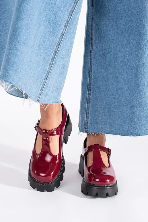 burgundy lacquered INomens boots...