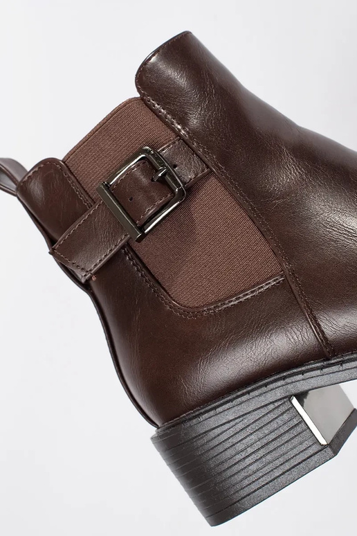 Brown Chelsea boots with buckle