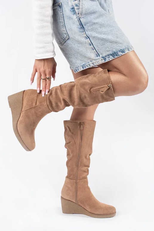 Beige suede long boots on platform