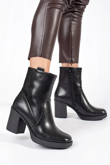Black leather heeled boots... 2