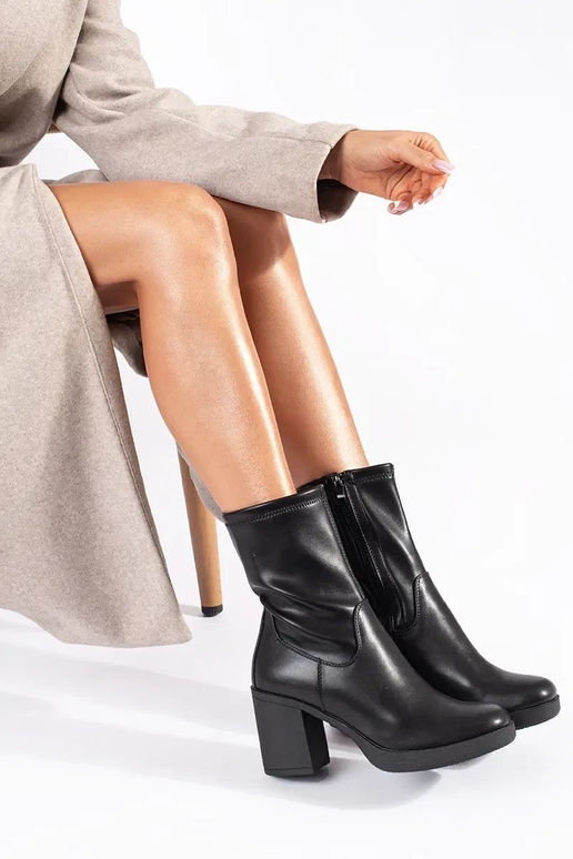 black women's shoes on the heel by...