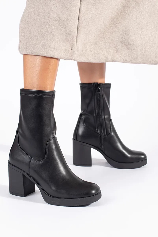 black women's shoes on the heel by...