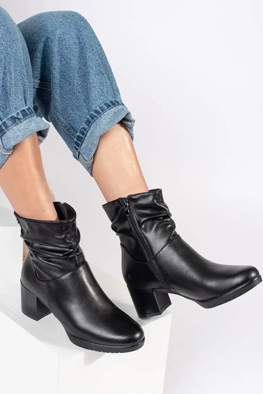 black leather women's heeled boots... black leather women's heeled boots...