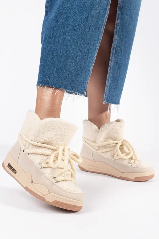 Beige women's snow boots on thick sole Beige women's snow boots on thick sole