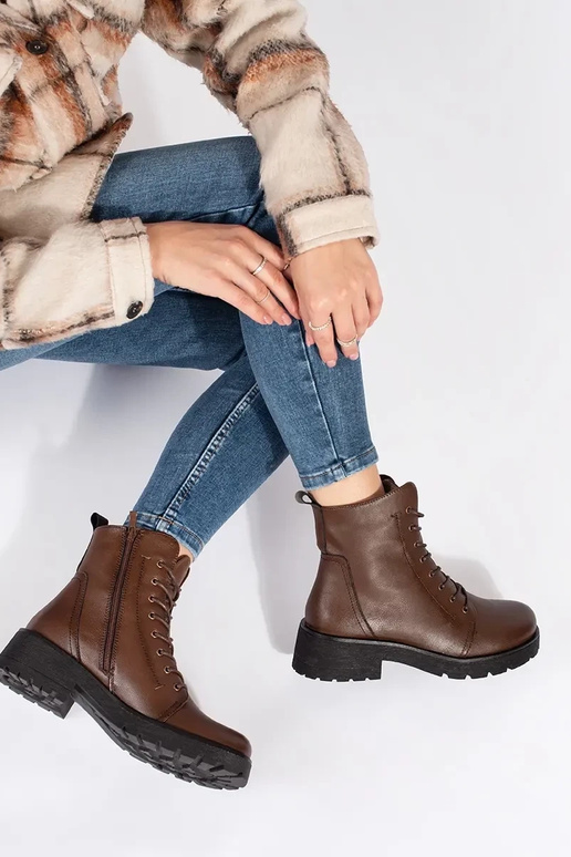 Leather darkBroInn color boots on a...