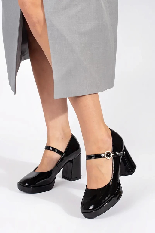 Black patent women's heeled ankle...