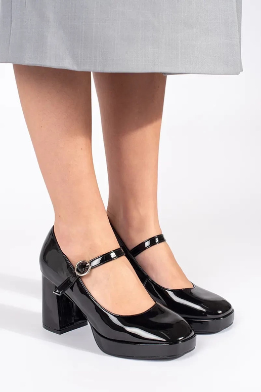 Black patent women's heeled ankle...