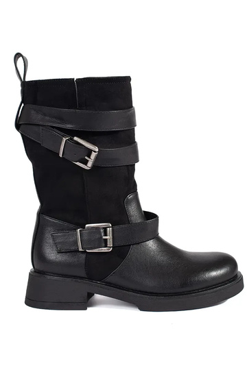 black Inomens boots on a...