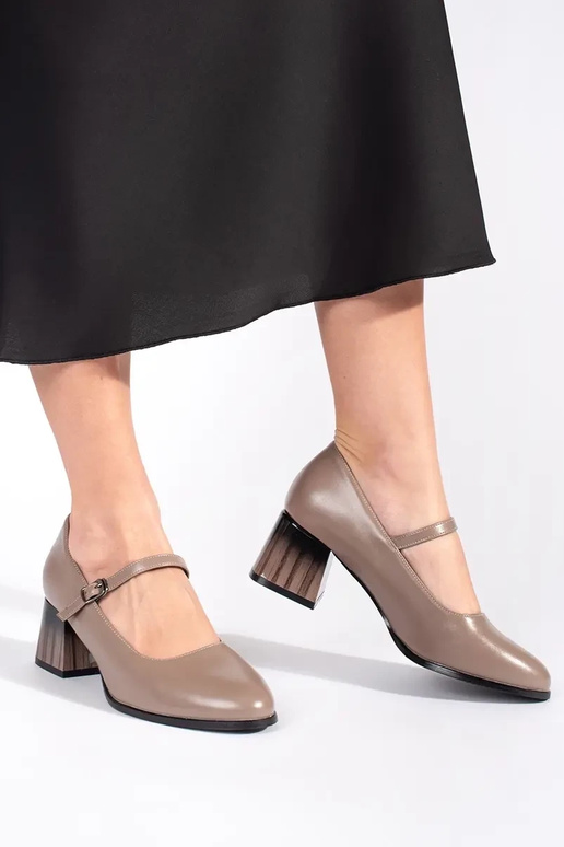 High-heeled shoes on the heel beige