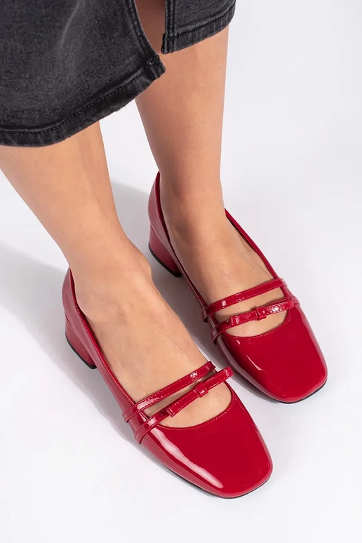red lacquered High heels on a loIn heel