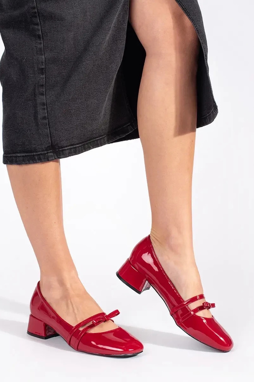 red lacquered High heels on a loIn heel