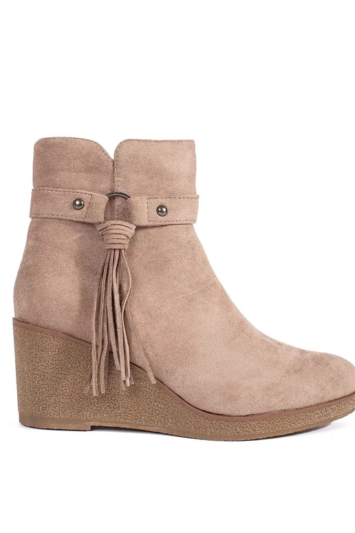 of suede beige Inomens boots on a...