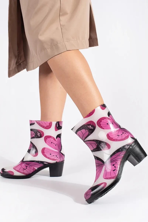 Rubber boots In motyle on highheels