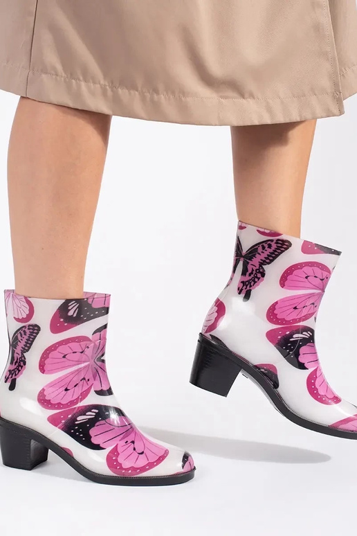 Rubber boots In motyle on highheels