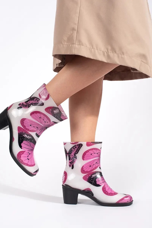 Rubber boots In motyle on highheels