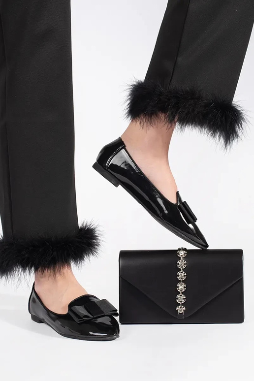 black Handbag clutch bag decorated...