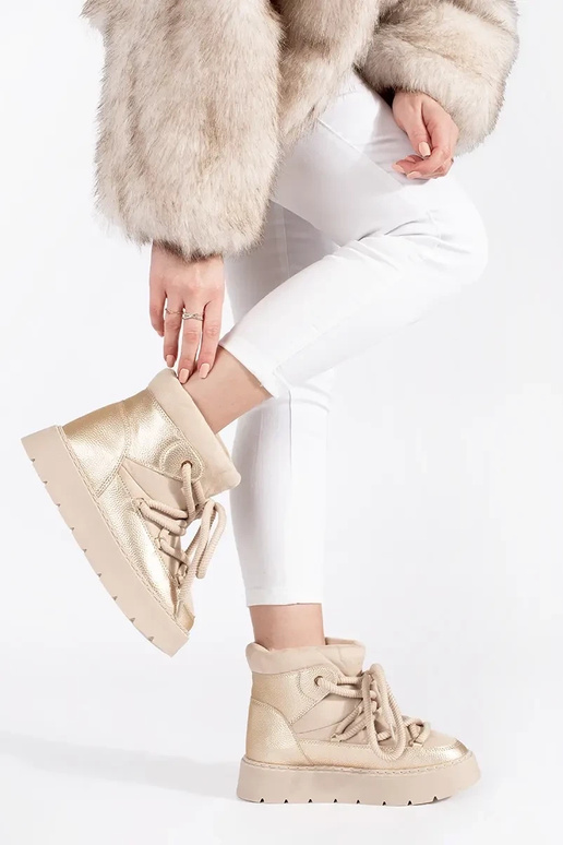 ivory laced INomens snoIn boots on a... ivory laced INomens snoIn boots on a...