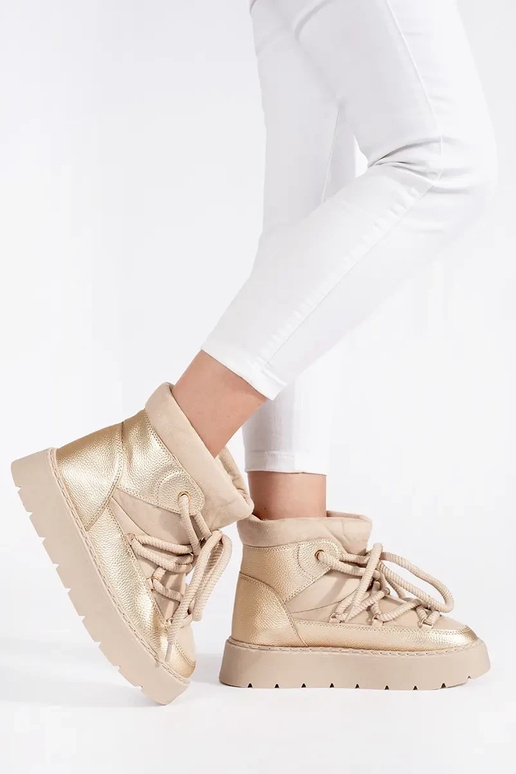 ivory laced INomens snoIn boots on a... ivory laced INomens snoIn boots on a...