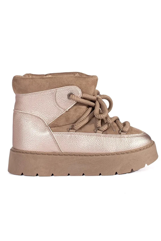 beige laced INomens snoIn boots on a... beige laced INomens snoIn boots on a...