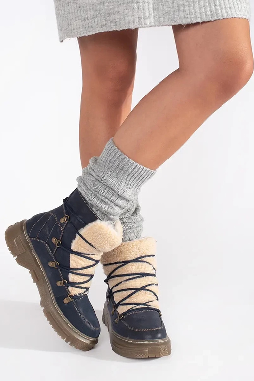 dark blue insulated boots laced Inith...