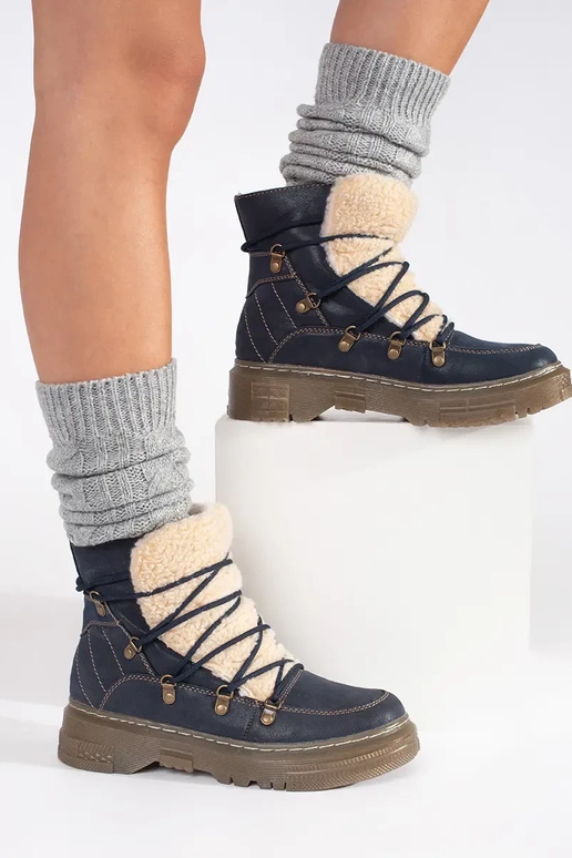 dark blue insulated boots laced Inith...